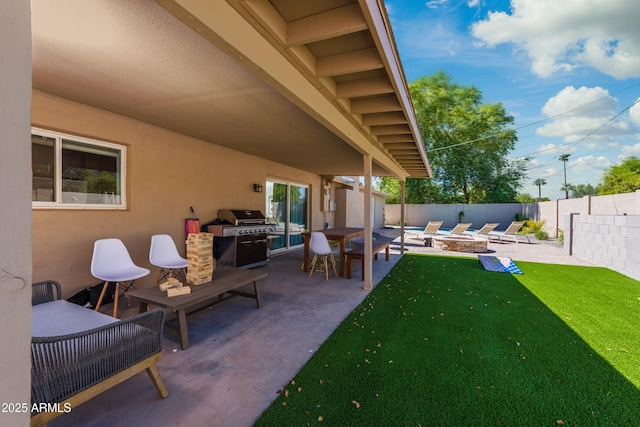 8338 E Monterosa St, Scottsdale, AZ 85251 - view of patio featuring area for grilling, a fenced backyard, and a fire pit