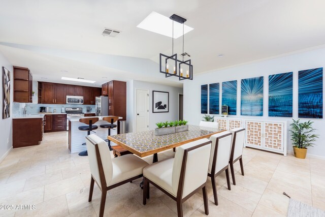8338 E Monterosa St, Scottsdale, AZ 85251 - dining area with baseboards, light tile patterned floors, a notable chandelier, and visible vents