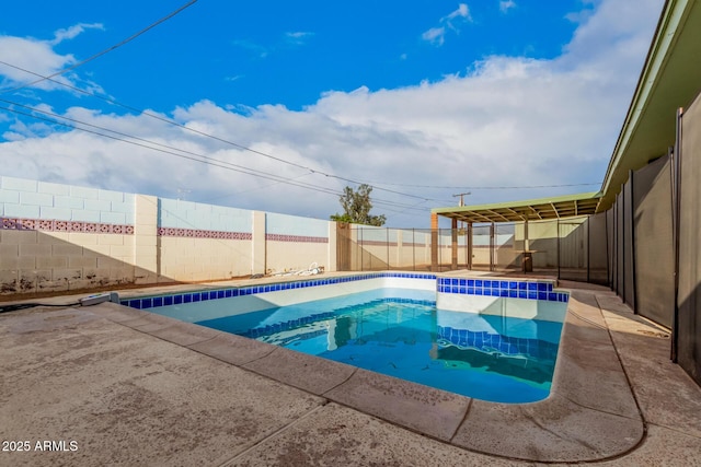 view of pool featuring a fenced backyard, a fenced in pool, and a patio