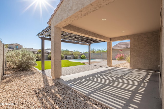 view of patio / terrace featuring a fenced in pool