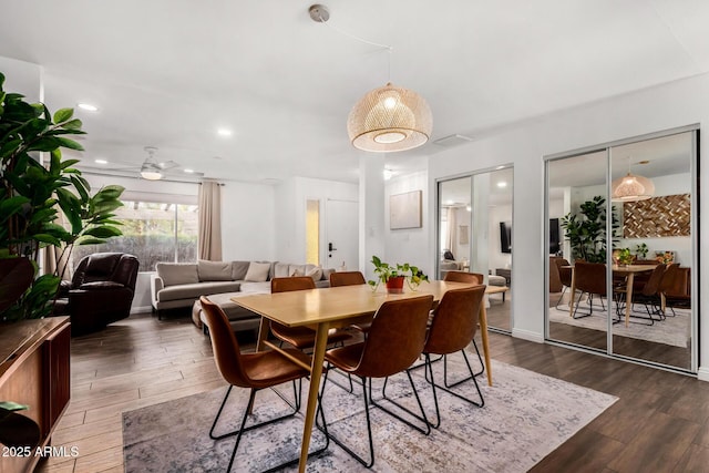 dining area featuring recessed lighting, dark wood-type flooring, and a ceiling fan