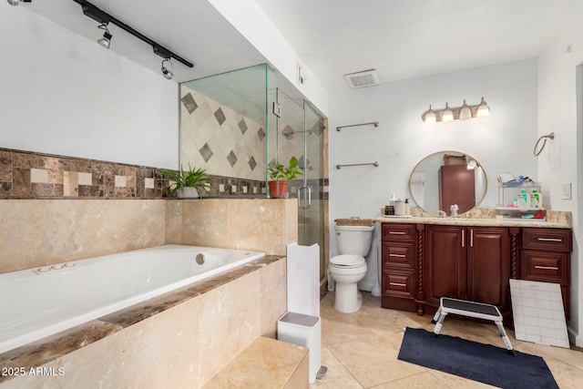 bathroom featuring visible vents, a shower stall, toilet, a bath, and vanity