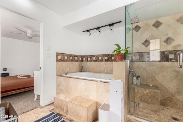 bathroom with a bath, a shower stall, tile patterned floors, and a ceiling fan