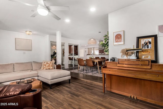 living area featuring recessed lighting, a ceiling fan, and wood tiled floor