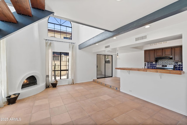 8844 S 51st St Unit 3, Phoenix, AZ 85044 - unfurnished living room with recessed lighting, light tile patterned flooring, and visible vents
