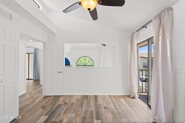 8844 S 51st St Unit 3, Phoenix, AZ 85044 - spare room with visible vents, a ceiling fan, baseboards, and wood finished floors