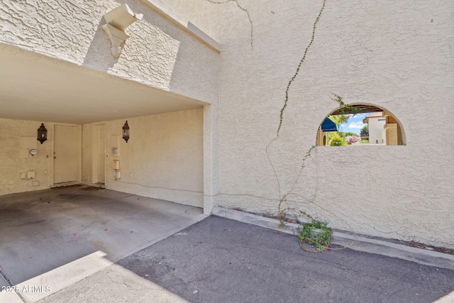 8844 S 51st St Unit 3, Phoenix, AZ 85044 - view of exterior entry featuring stucco siding