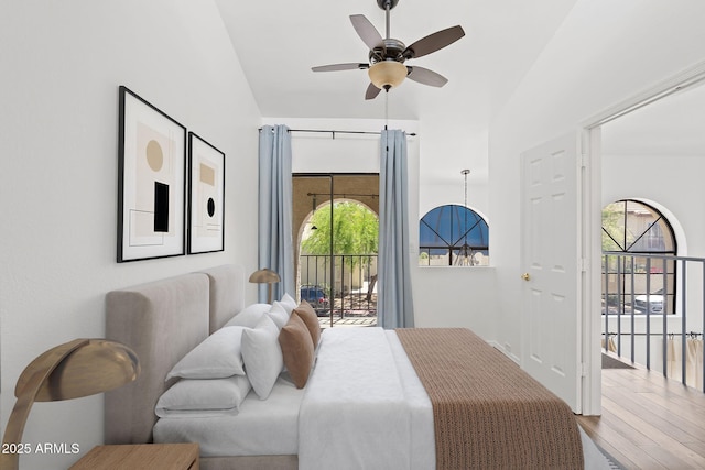 8844 S 51st St Unit 3, Phoenix, AZ 85044 - bedroom with access to outside, ceiling fan, wood finished floors, and vaulted ceiling