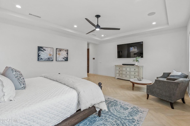 bedroom with a ceiling fan, recessed lighting, a raised ceiling, and visible vents