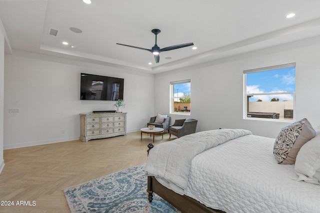 bedroom with recessed lighting, a raised ceiling, and visible vents