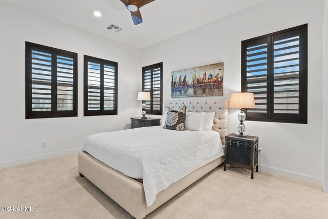 carpeted bedroom with baseboards, visible vents, ceiling fan, and recessed lighting