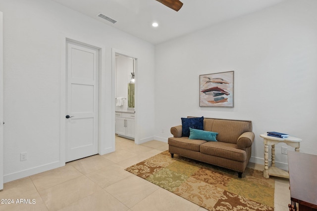 sitting room with light tile patterned floors, recessed lighting, visible vents, ceiling fan, and baseboards