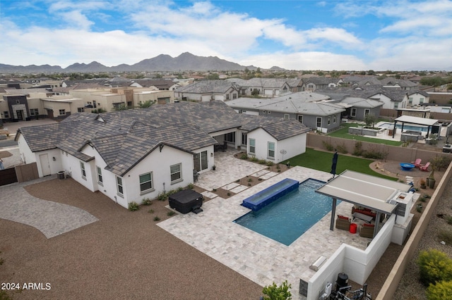 bird's eye view featuring a residential view and a mountain view