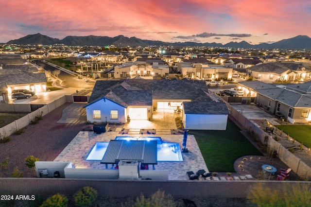 birds eye view of property featuring a residential view and a mountain view