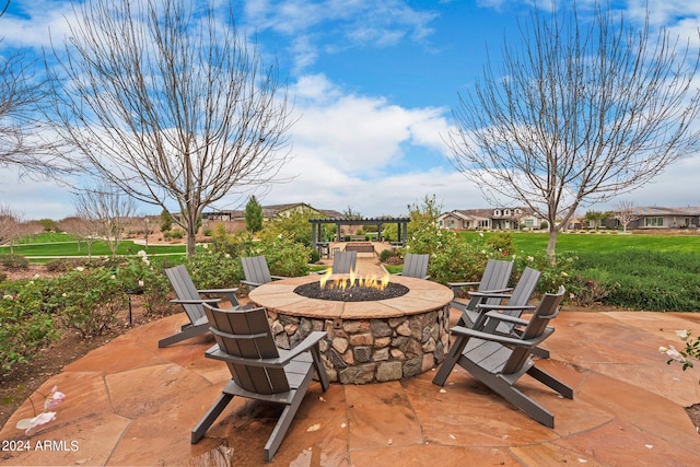 view of patio featuring an outdoor fire pit and a pergola