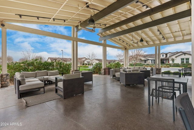 view of patio / terrace featuring outdoor lounge area and a residential view