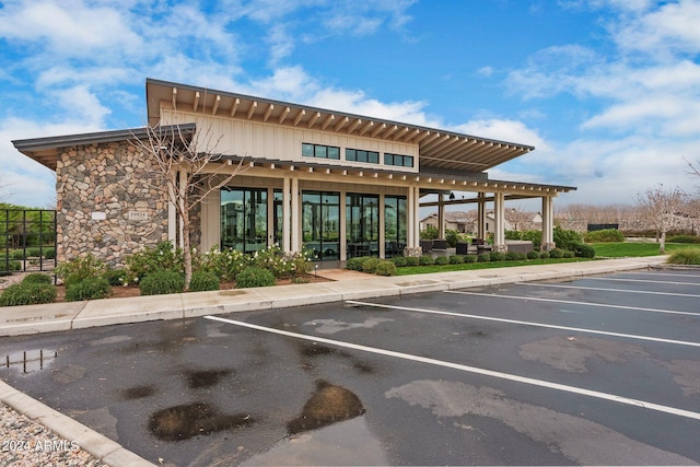 exterior space featuring uncovered parking