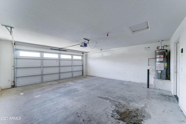 garage featuring gas water heater and a garage door opener