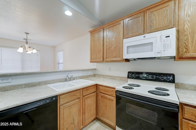 kitchen featuring white microwave, a sink, light countertops, range with electric stovetop, and dishwasher