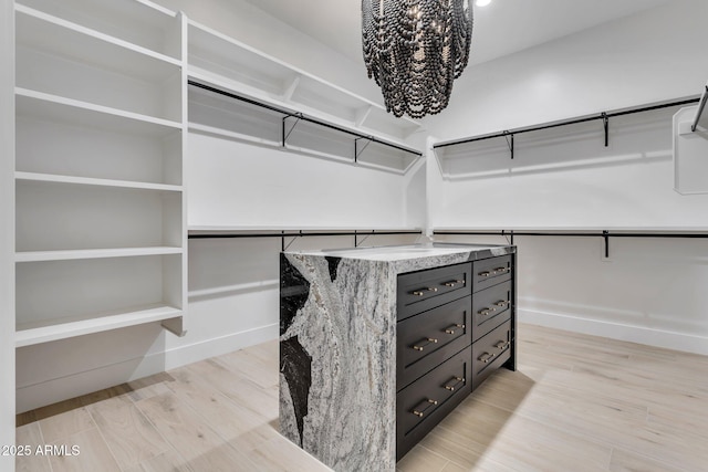 walk in closet featuring light wood-type flooring