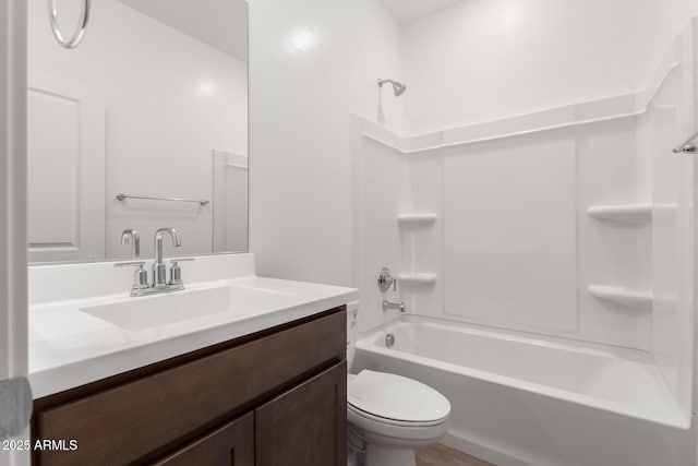 full bathroom with shower / washtub combination, toilet, and vanity