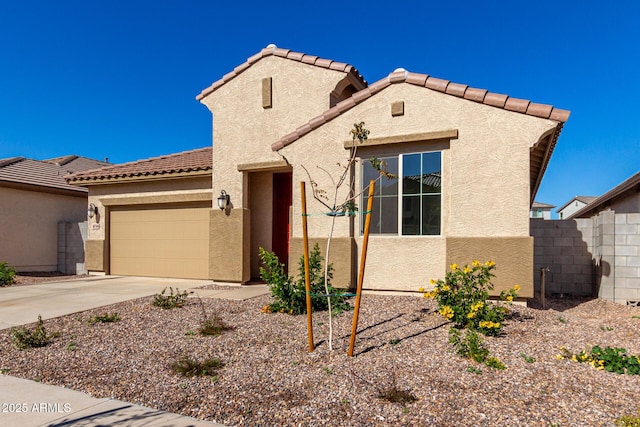 view of front of property with a garage