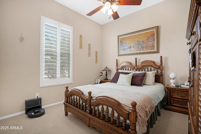 bedroom with carpet floors, ceiling fan, and baseboards