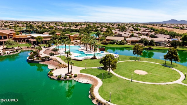 aerial view with a water view and a residential view