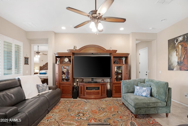 tiled living area with visible vents, a ceiling fan, and recessed lighting