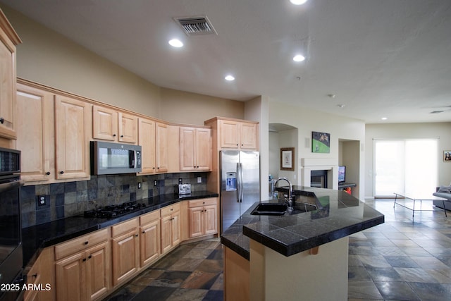 14045 E Geronimo Rd, Scottsdale, AZ 85259 - kitchen with tile countertops, visible vents, a sink, stainless steel fridge, and light brown cabinets