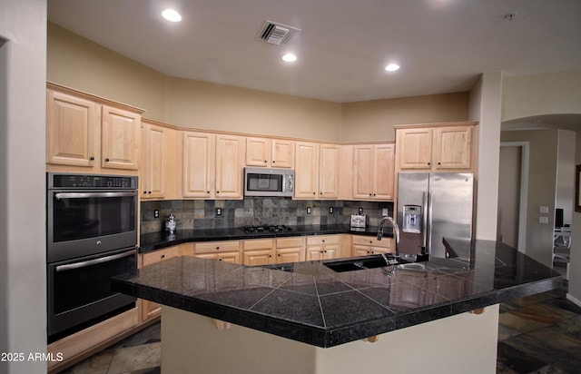 14045 E Geronimo Rd, Scottsdale, AZ 85259 - kitchen with tile counters, appliances with stainless steel finishes, a sink, and light brown cabinets