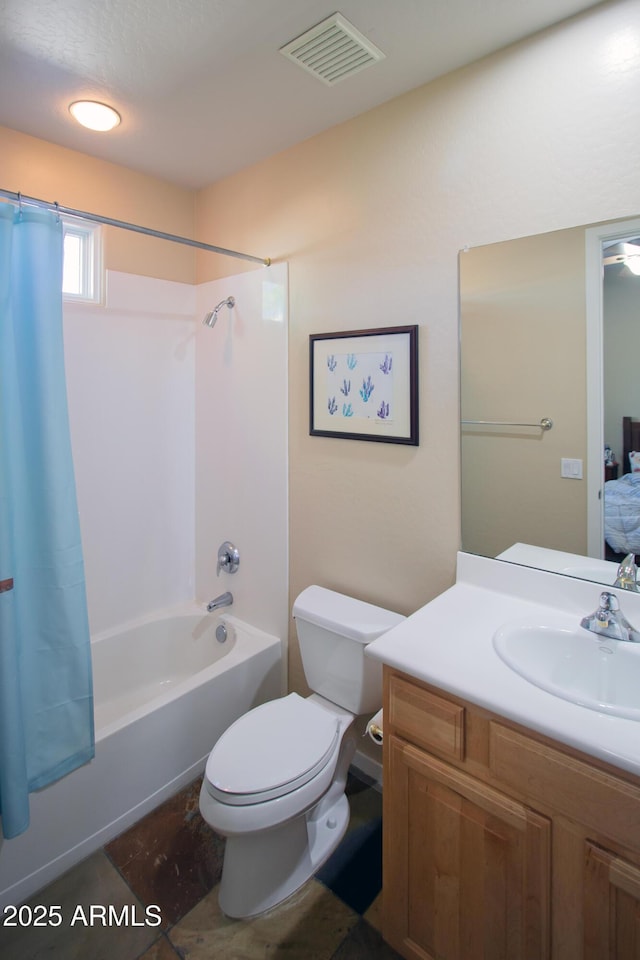 14045 E Geronimo Rd, Scottsdale, AZ 85259 - full bathroom featuring visible vents, shower / tub combo with curtain, toilet, and vanity