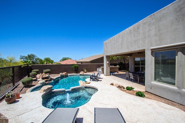 14045 E Geronimo Rd, Scottsdale, AZ 85259 - view of swimming pool featuring a fenced backyard, outdoor dining space, a pool with connected hot tub, and a patio area