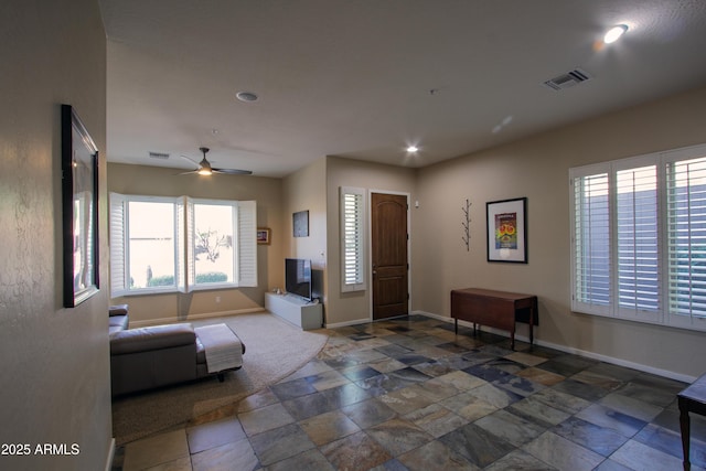 14045 E Geronimo Rd, Scottsdale, AZ 85259 - interior space featuring visible vents, stone tile floors, and baseboards