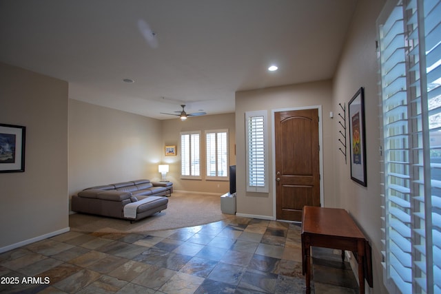 14045 E Geronimo Rd, Scottsdale, AZ 85259 - entryway featuring recessed lighting, baseboards, stone finish floor, and ceiling fan