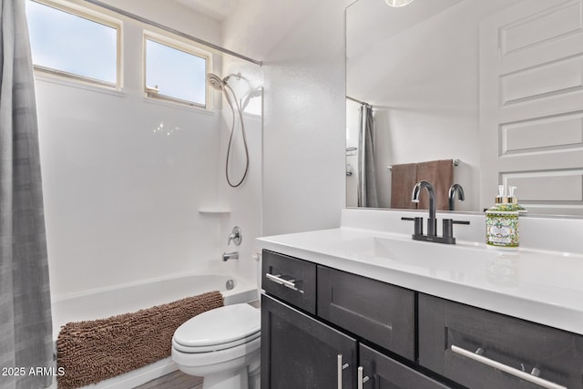 full bathroom with toilet, shower / bath combo, and vanity