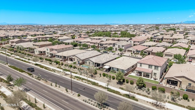 aerial view of residential area with a mountain backdrop