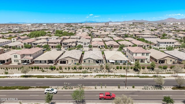 aerial view of residential area with a mountainous background