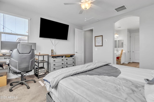 bedroom with light carpet and ceiling fan