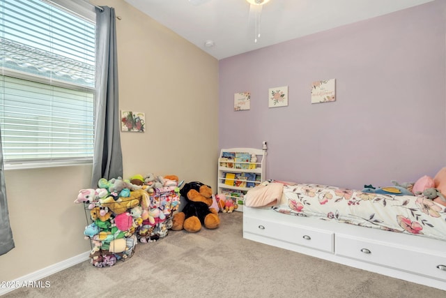 carpeted bedroom with ceiling fan