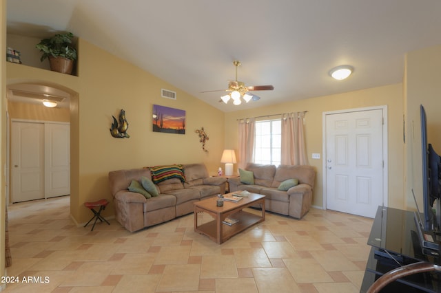 living room with ceiling fan and vaulted ceiling