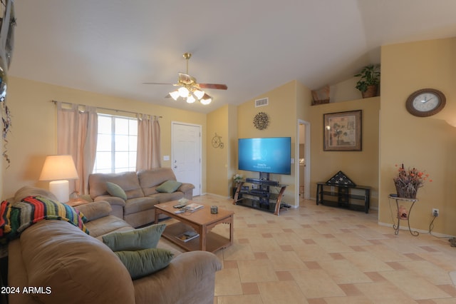 living room with ceiling fan and lofted ceiling