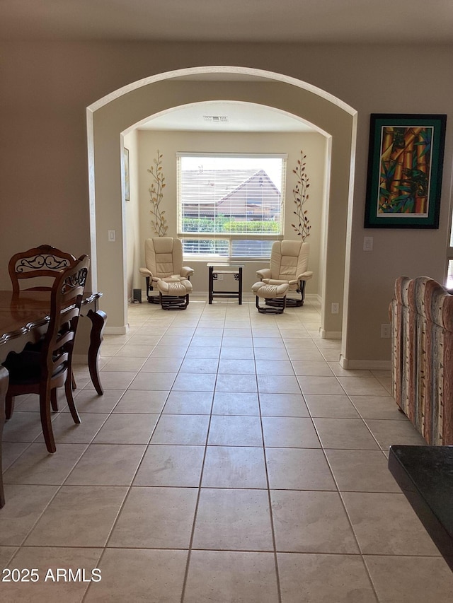 sitting room featuring light tile patterned floors