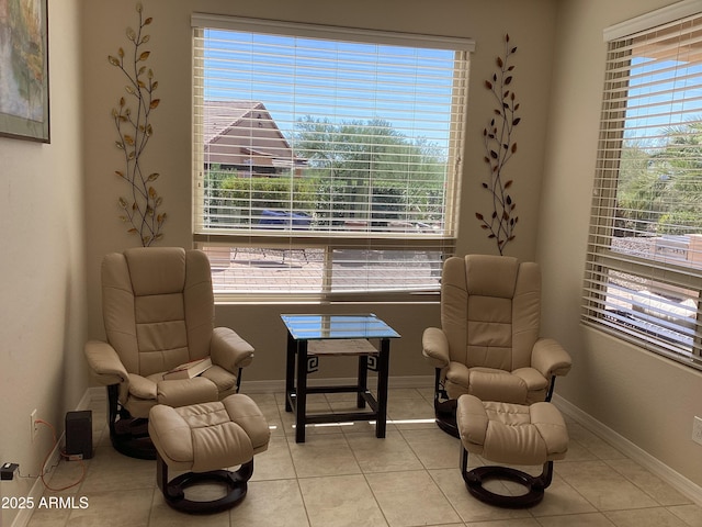 living area with light tile patterned floors