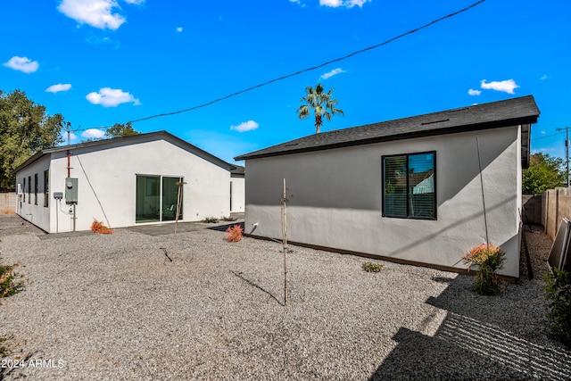 rear view of house featuring a patio