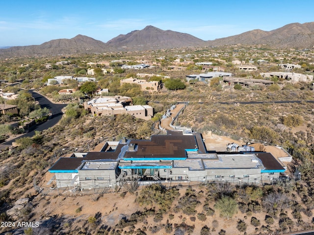 birds eye view of property featuring a mountain view