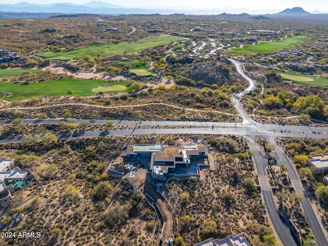 bird's eye view featuring a mountain view and view of golf course