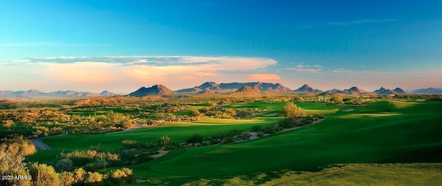 view of home's community featuring golf course view and a mountain view