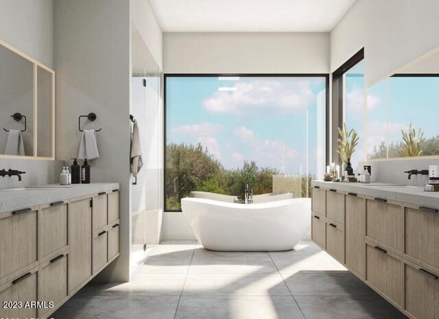 bathroom featuring vanity and a bath