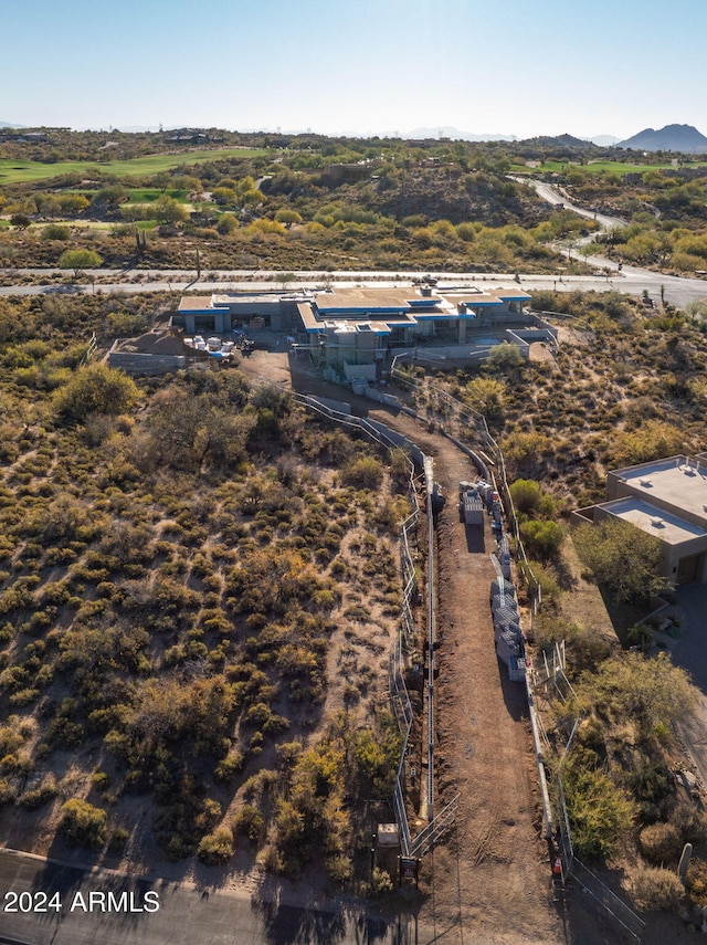 drone / aerial view featuring a mountain view